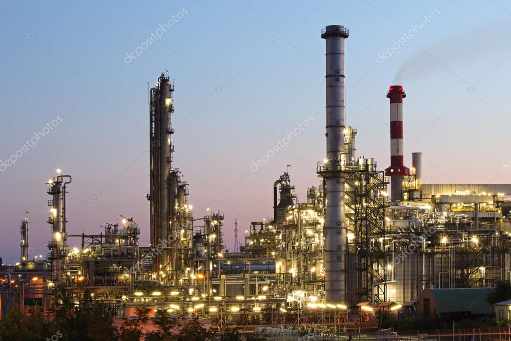 Oil and gas industry refinery at twilight factory petroche Stock
