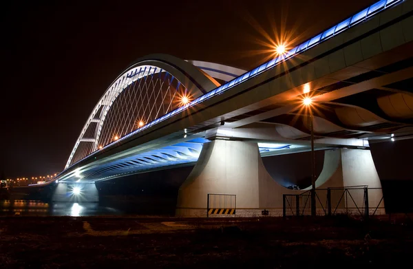 Bridge in Bratislava downtown during night. Slovakia. Name of br — Stock Photo, Image