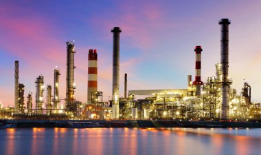 Oil refinery industrial plant at night clipart