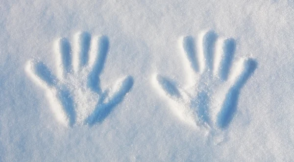 Handprints na śniegu — Zdjęcie stockowe