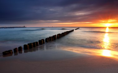 Baltic sea at beautiful sunrise clipart