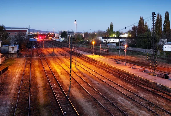 Train railroad at night — Stock Photo, Image