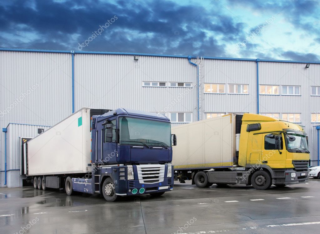 Cargo truck at warehouse building — Stock Photo © TTstudio 39892897