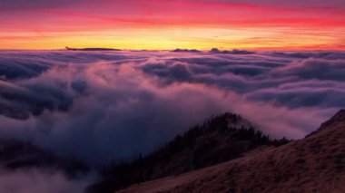 Time lapse of Sunset autumn mountains above the clouds during the weather inversion Fatra mountains in Slovakia, beautiful landscape