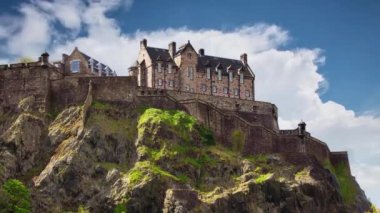 Time lapse - Castle hill in Edinburgh with green grass and blue sky, Scotland, UK