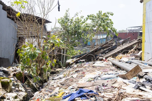 Mumbai,India-7-28-2022: Garbage dumped on the banks on Meeti river sweet river near Kalina area.