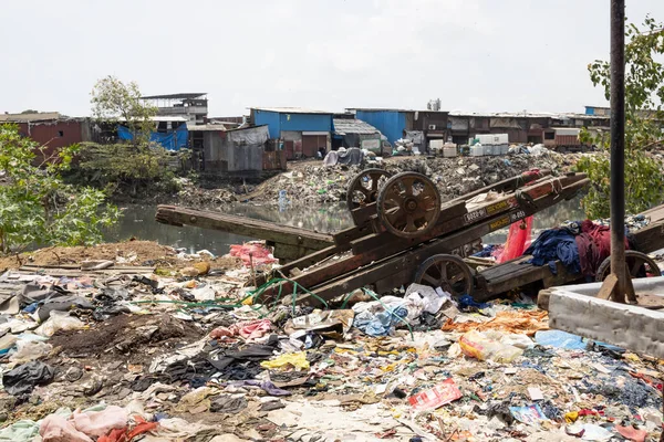 Mumbai,India-7-28-2022: Garbage dumped on the banks on Meeti river sweet river near Kalina area.