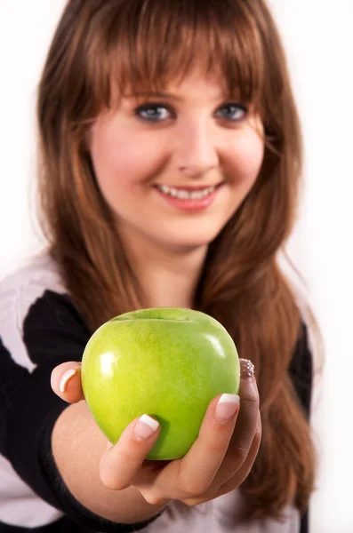 Teen girl and an apple Stock Image
