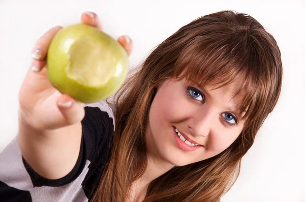 Teen girl's apple. — Stock Photo, Image