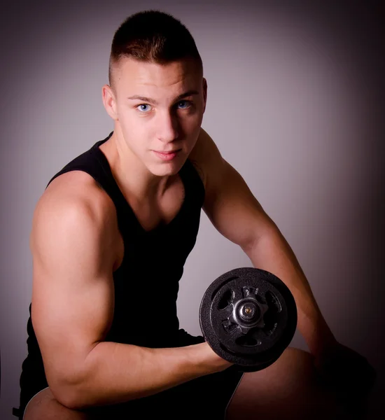 Fitness man with dumbbell. — Stock Photo, Image