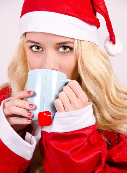 Menina de Natal em roupas de Papai Noel — Fotografia de Stock