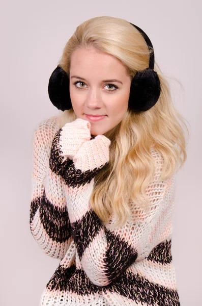 Winter girl with earmuffs — Stock Photo, Image