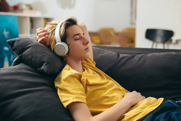 Teenager Boy Listening Music Headphones Relaxing Sofa Home — Stock Photo, Image