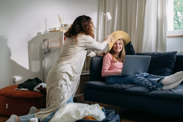 Mother Her Daughter Having Fun While Packing Suitcases Summer Trip — Stockfoto