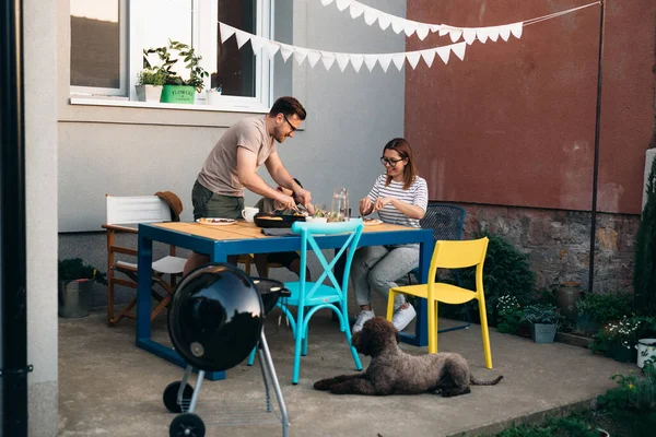 Family Having Lunch Sitting Table Eating Home Backyard — Stockfoto