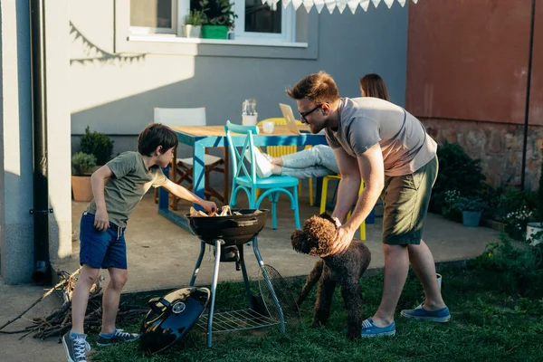 Father Son Preparing Fire Barbecue Home Backyard — Stok fotoğraf