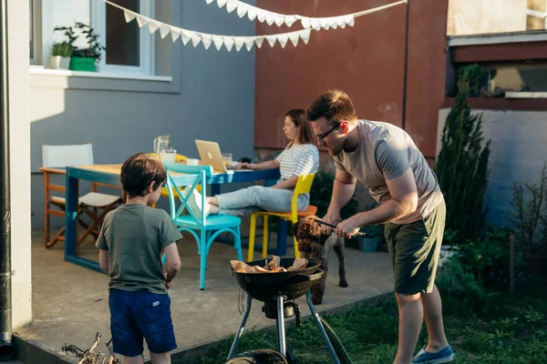 Father Son Preparing Fire Barbecue Home — Stockfoto