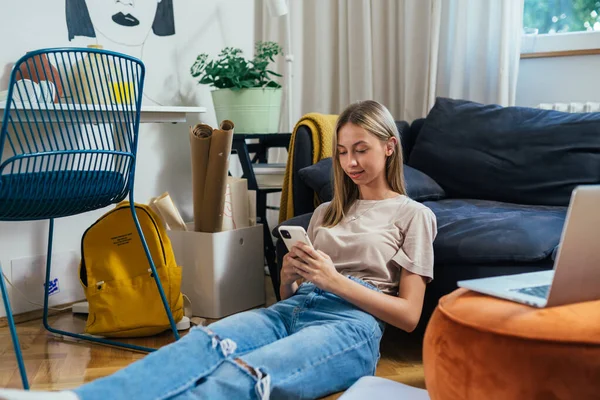 Young Teenager Girl Sitting Her Room Using Mobile Phone — Stockfoto