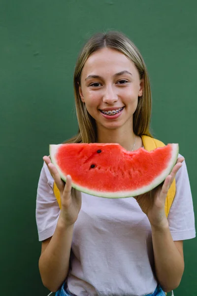 Portrait Caucasian Teenager Girl Holding Slice Watermelon Green Background — Stockfoto