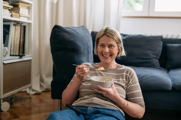 Mid Adult European Woman Watching Television Eating Corn Flakes Living — Stock Photo, Image