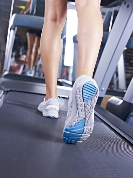 Legs on treadmill — Stock Photo, Image