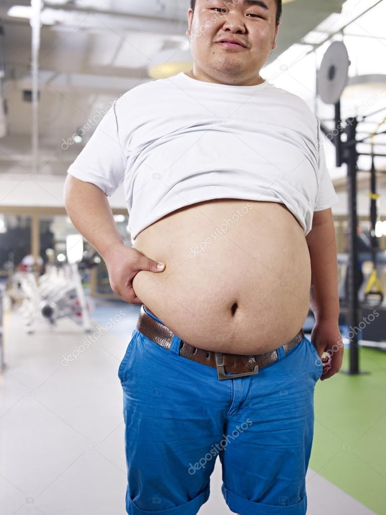 Overweight man in gym