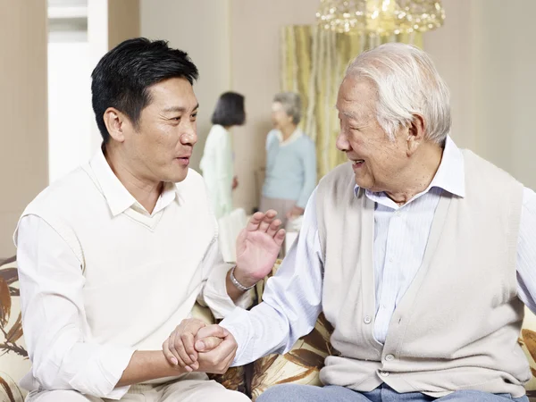 Senior father and adult son — Stock Photo, Image