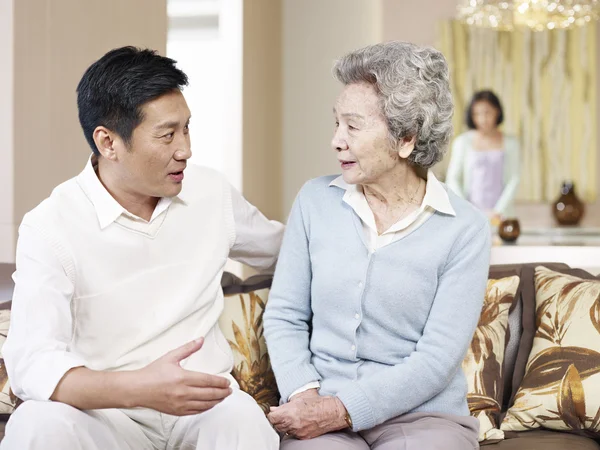 Senior mother and adult son — Stock Photo, Image