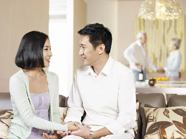 Asian couple holding hands — Stock Photo, Image