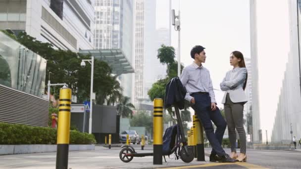 Asian Businessman Businesswoman Standing Street Talking Downtown Business District — Stock video