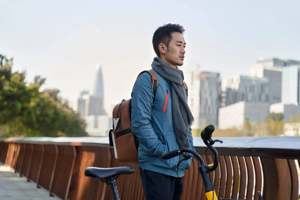 Young Asian Man Standing River Public Park Next Bike Thinking — Stock Photo, Image