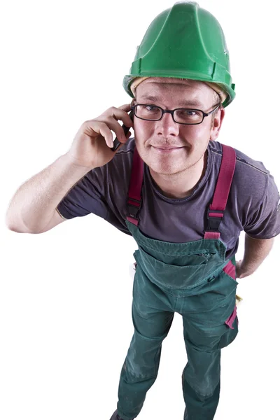 Construction worker with smartphone — Stock Photo, Image