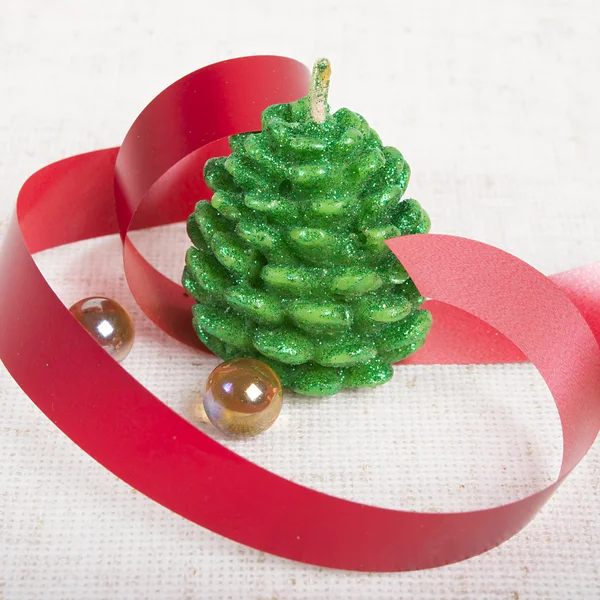 Festival ornament with candle, ribbon and glass  beads — Stock Photo, Image