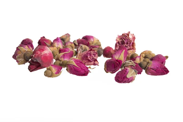 Brotes secos de flor de rosa para el té en blanco — Foto de Stock