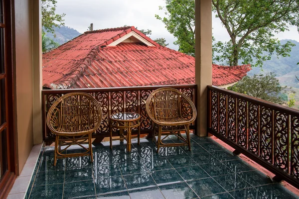 Wicker chair on the veranda, Chinese, Northern Thailand — Stock Photo, Image