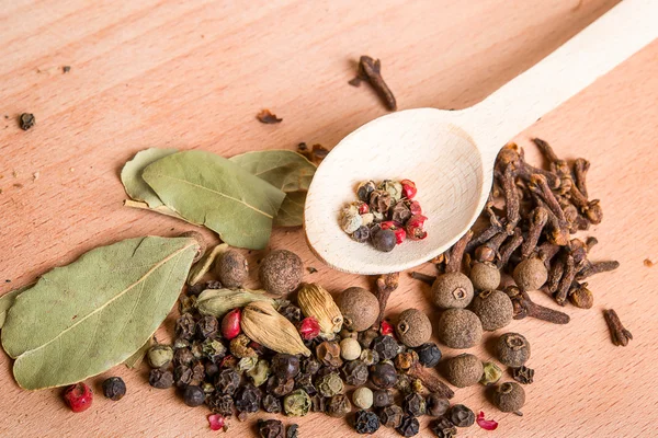 Wood spoon with spices — Stock Photo, Image