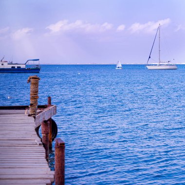 Sailboat harbor, many beautiful moored sail yachts in the sea port, summertime vacation.