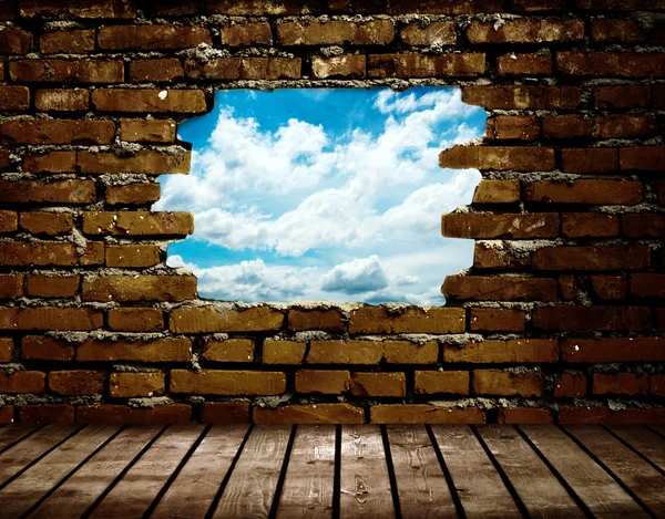 Porous wall to see the blue sky — Stock Photo, Image