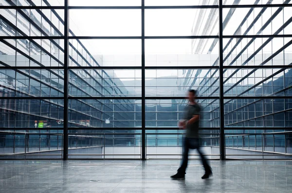 Silhouette in hall of office building — Stock Photo, Image