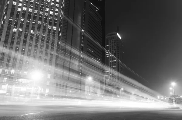 Traffic in city at night in black and white toned — Stock Photo ...