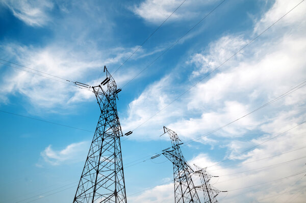 High-voltage tower sky background