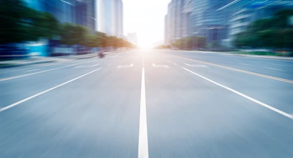 Road in city with sunset — Stock Photo, Image