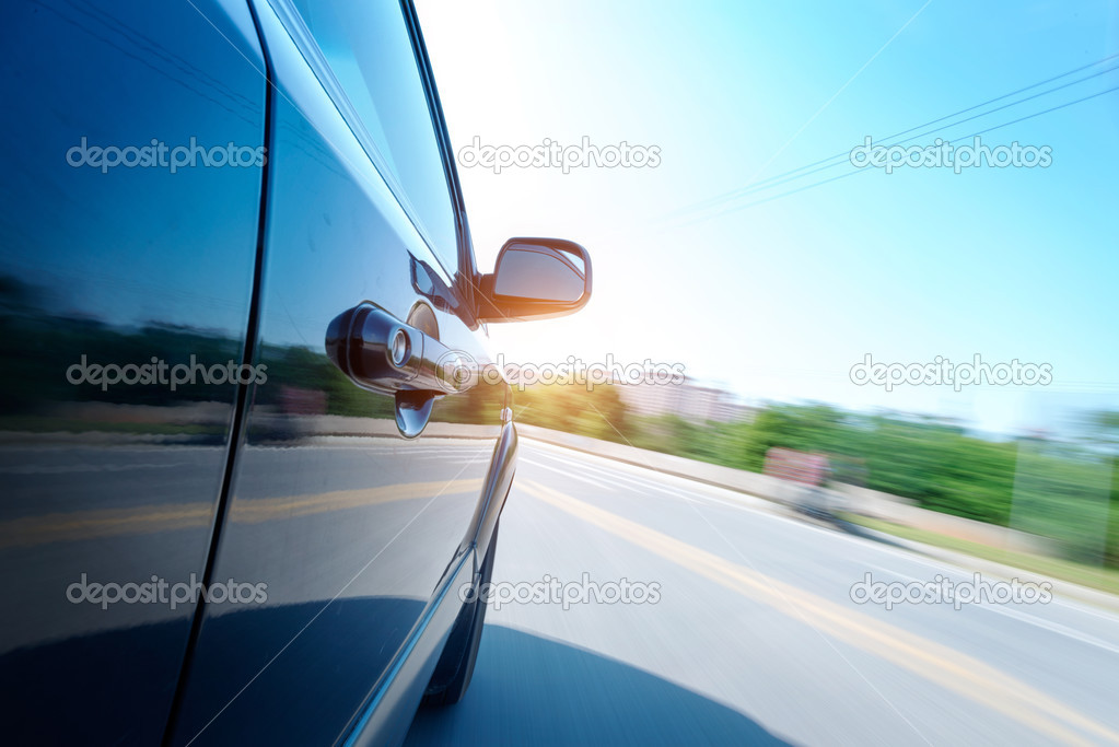 Car on the road with motion blur background