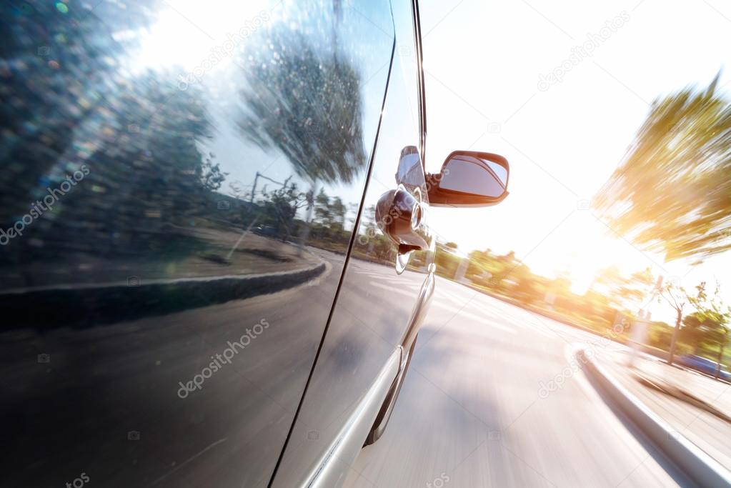 Car on the road with motion blur background