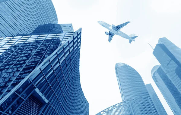 The airplane with the city — Stock Photo, Image