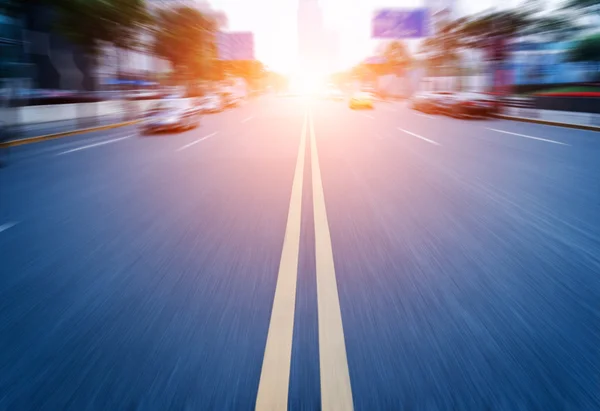 Road in city with sunset — Stock Photo, Image