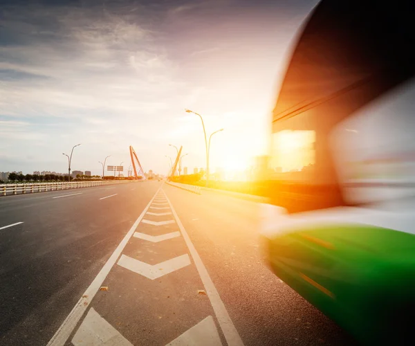 Speeding truck go through the bridge — Stock Photo, Image