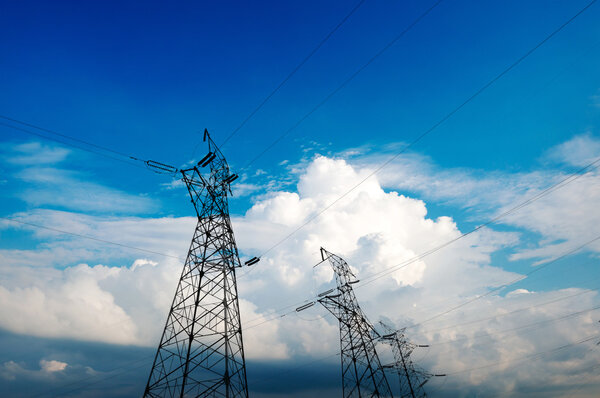 High-voltage tower sky background