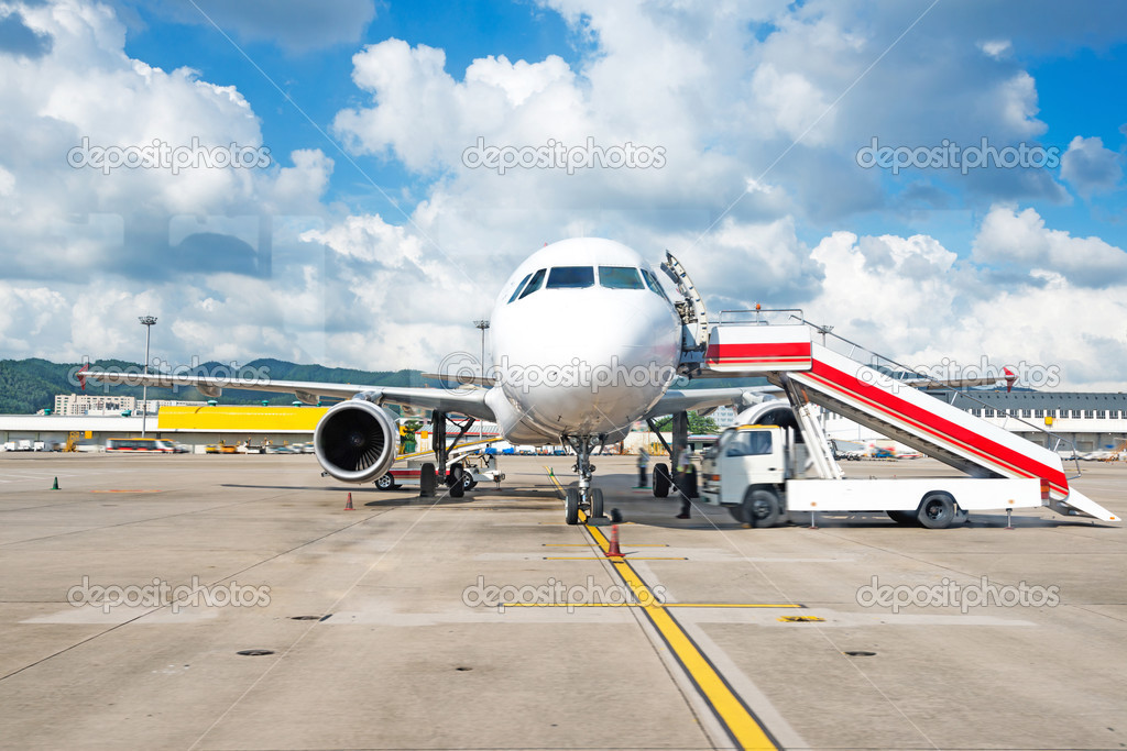 The plane at the airport on loading