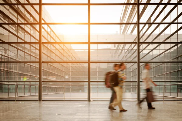 People silhouette in hall of office building — Stock Photo, Image